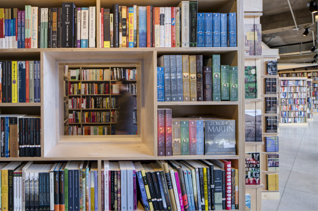"Browse over 100,000 carefully curated, largely academic titles in the labyrinthine stacks of the Seminary Co-op Bookstore" photo by Tom Rossiter