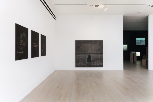 Retrogarde, 2016, installation view in the Logan Center Gallery, featuring works by Caroline Bergvall, Brendan Fernandes, Samson Kambalu, Matthew Metzger, Catherine Sullivan and Samson Young. Photo by RCH | EKH.