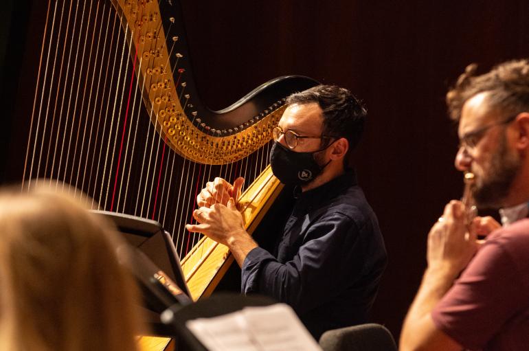 Harpist Ben Melsky in rehearsal