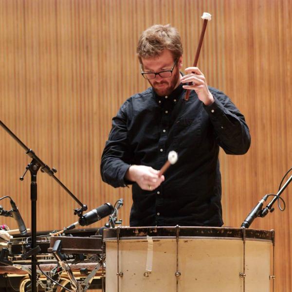 Hunter Brown in performance playing a drum