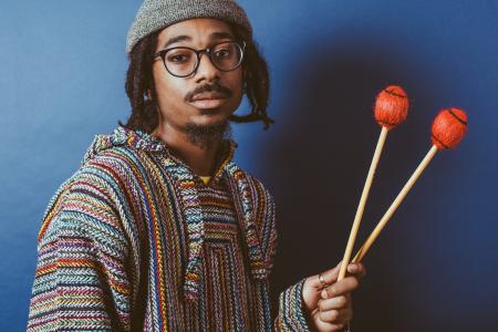 Joel Ross holding vibraphone mallets