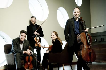 St. Lawrence String Quartet seated with instruments