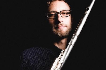 Tim Munro holding flute
