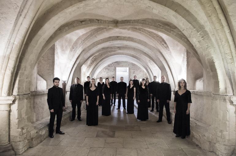 Tenebrae choir in a vaulted stone hallway