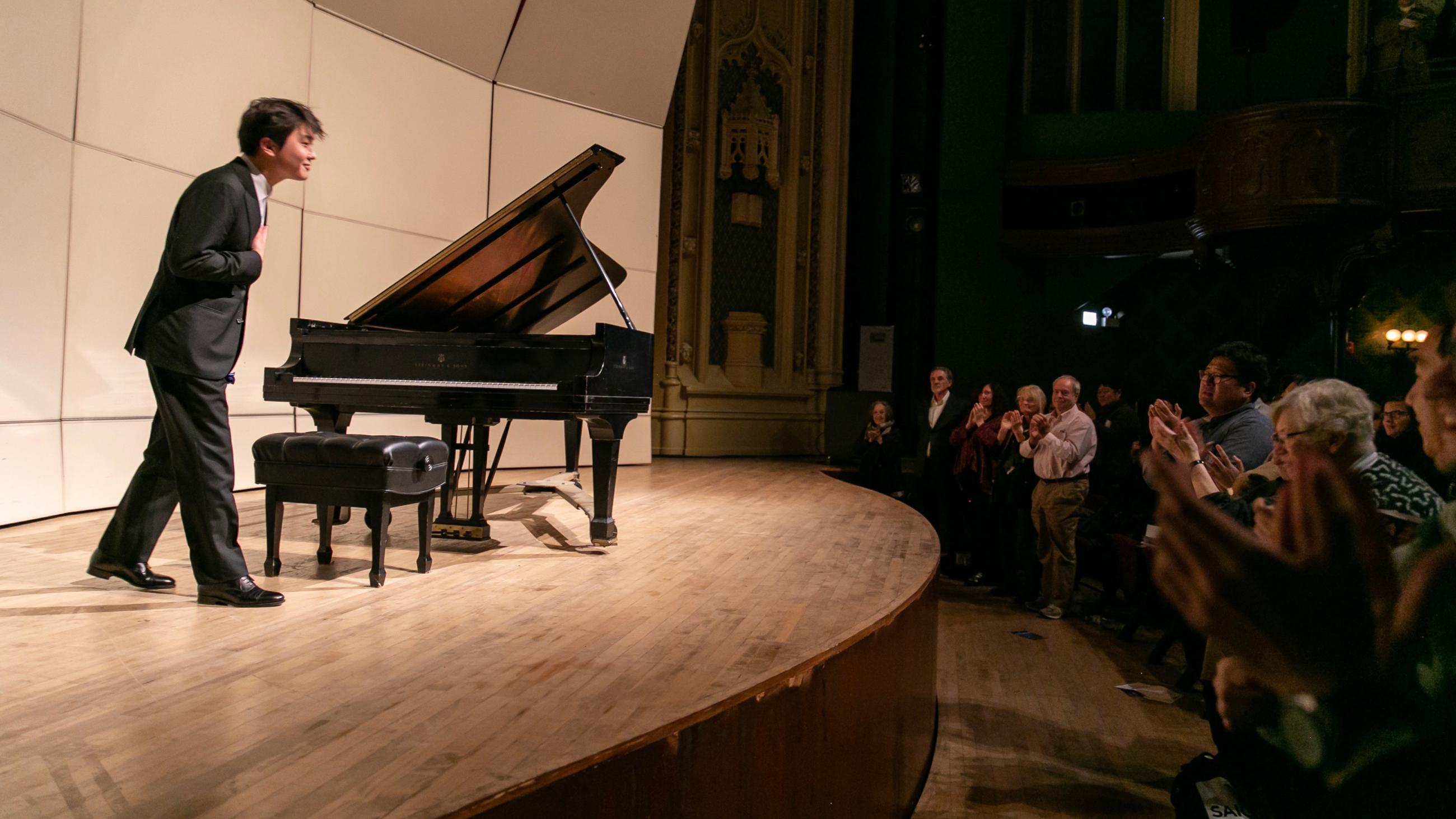 Pianist Seong-Jin Cho takes about to thank an appreciative audience