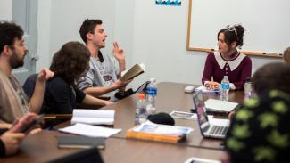  Lect. Rachel DeWoskin (right) leads students in a fiction writing course at Taft House.