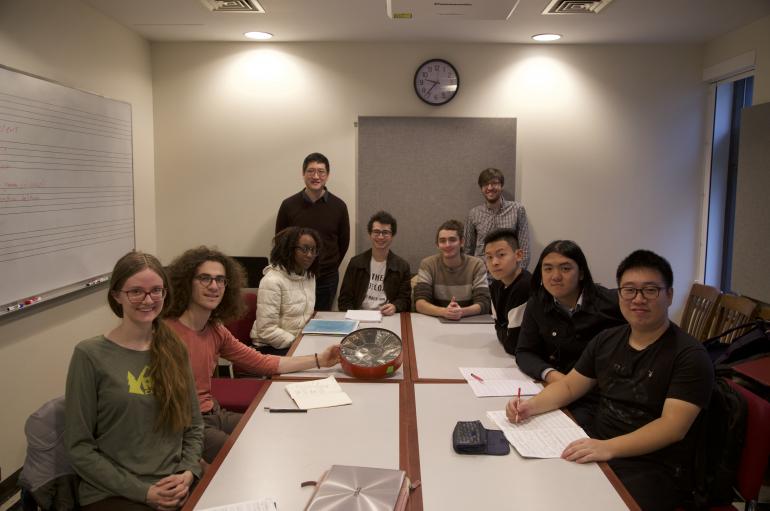 Anthony Cheung's advanced composition class seated around a conference table