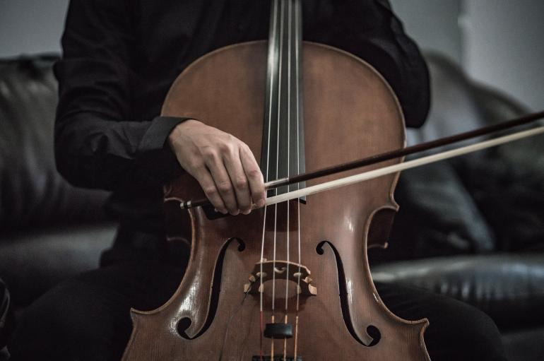 A man playing cello