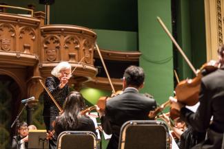 Barbara Schubert conducts the University Symphony Orchestra